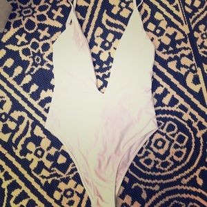 White plunging one piece swimsuit